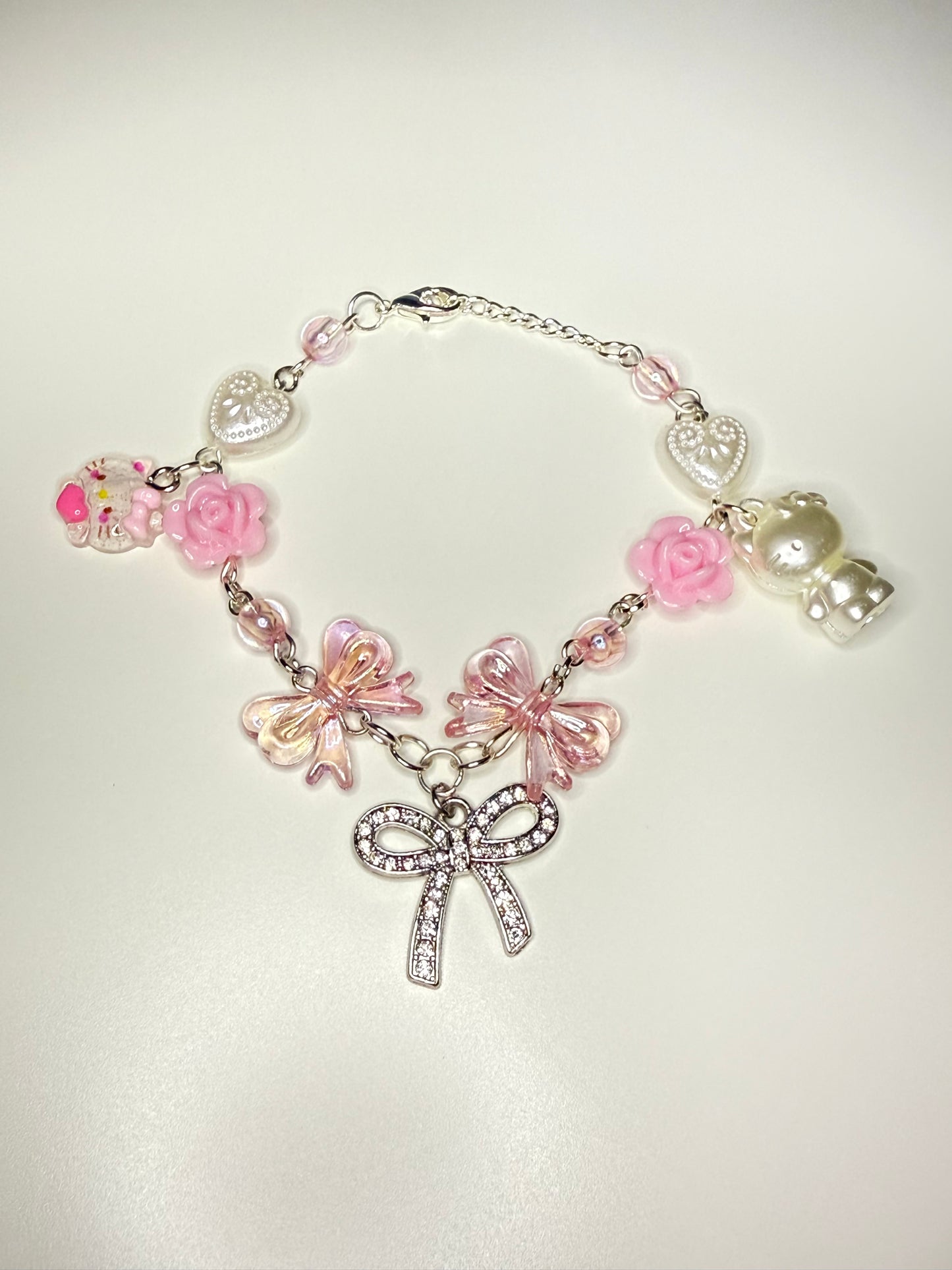 Hello kitty bow inspired charm bracelet