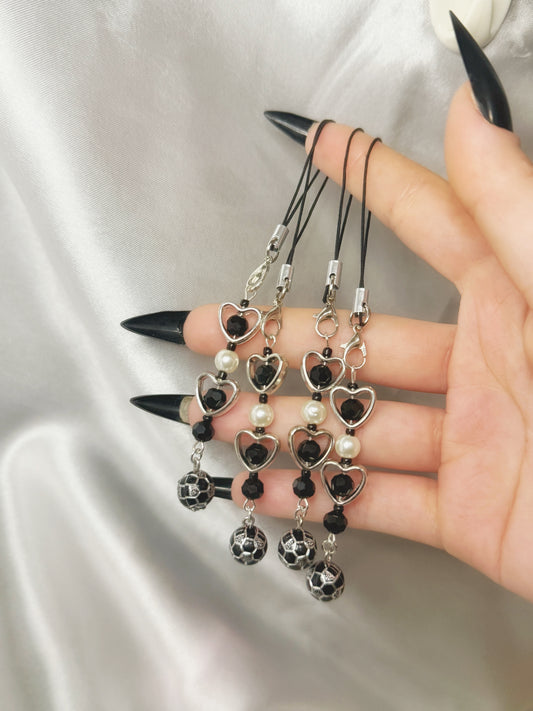 Black football phone charm