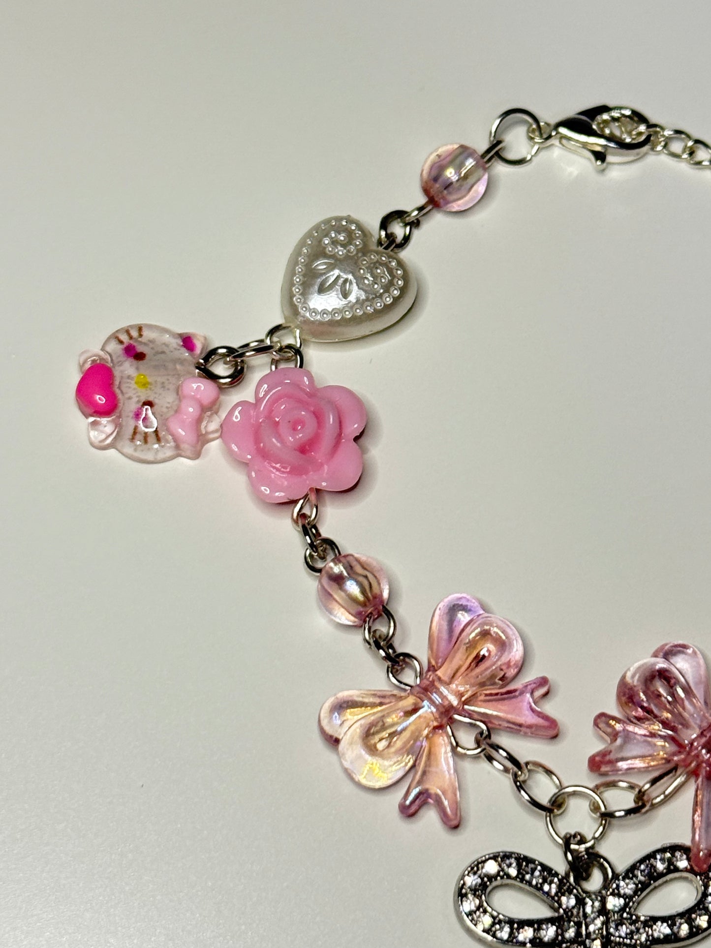 Hello kitty bow inspired charm bracelet