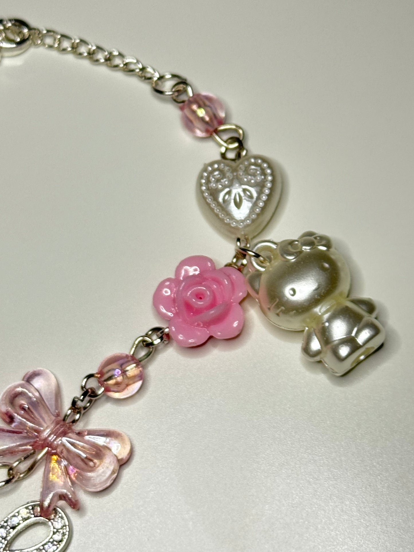 Hello kitty bow inspired charm bracelet